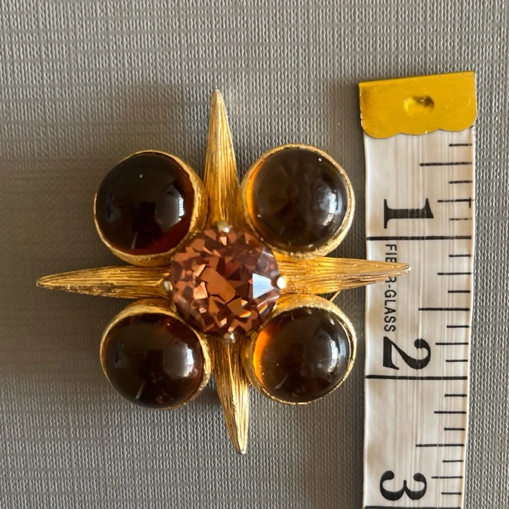 Vintage Benedikt NY Maltese cross brooch, with faceted amber glass stones .